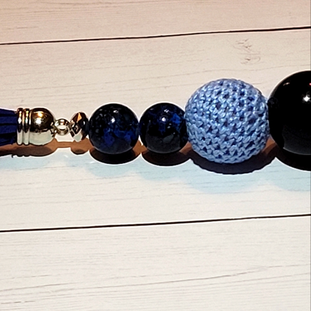 Beaded keychains & bracelets. You choose the colors.